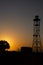 A vintage lighthouse at sunset