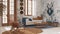 Vintage living room in boho chic style in white and blue tones. Sofa and rattan rocking chair on jute carpet. Bohemian interior