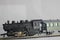 Vintage locomotive pulling wagon toy miniature