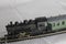 Vintage locomotive pulling wagon toy miniature