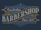 Vintage logo for the barbershop on the dark background