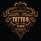 Vintage logo for the tattoo studio on the dark background.