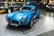 Vintage luxury cupercar Ford Shelby AC Cobra at a motor show, front view