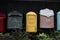 Vintage mailbox. Beautiful old-fashioned mailboxes black yellow red. Shabby weathered postbox set