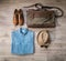 Vintage male clothing and accessories on the wooden background