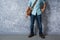 Vintage men clothings retro style with low key lighting over loft concrete wall background.