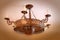 Vintage metal chandelier, bronze light fixture, selective focus