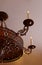 Vintage metal chandelier, bronze light fixture, selective focus