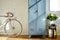 Vintage metal locker bike and vivid decoration in whitebrick studio