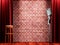 Vintage metal microphone against red curtain on empty theatre stage. 3d render