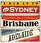 Vintage metal signs collection with Australian cities