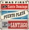 Vintage metal signs and souvenirs collection with cities in Dominican Republic