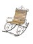 Vintage metallic wooden forged rocking chair isolated over white