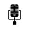 Vintage microphone black glyph icon