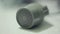 Vintage microphone of misic equipment lie on table. Someone take it. Close up