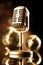 Vintage microphone, music saturated concept