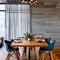 A vintage, mid-century modern dining room with iconic Eames chairs, a teak dining table, and vintage light fixtures1, Generative
