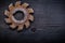 Vintage milling cutter with cogs on wood board