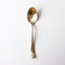 Vintage Modernism: A Captivating Golden Spoon Infused With Social Commentary