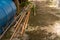 Vintage Moldy Concrete Ground with Old Long PVC Water Pipes - Outdoor Garden/ Sunny