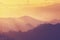 Vintage nature background, mountains at sunset,