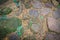 Vintage nature cobblestone and pebbles pavement in disorganized