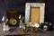 Vintage objects on the table, old box, lamp, clock, pen, and other things