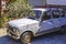 Vintage and obsolete car parked in a street of Ohrid, Macedonia