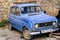 Vintage and obsolete car parked in a street of Ohrid, Macedonia