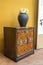 vintage(old) furniture in the luxury living room(gold wall, marble stone, wood frame) at the day light.