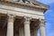 Vintage Old Justice Courthouse Column. Neoclassical colonnade with corinthian columns as part of a public building