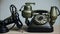 Vintage old telephone with binoculars conceptual still life