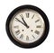 Vintage and old wall clock isolate on white.
