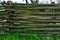 Vintage an old wicker fence on green grass