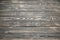 Vintage old wooden background. Grey and brown antique panels. Rough texture. Shaggy and grained floor