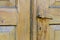 vintage. old wooden door and rusty iron door knob. close-up