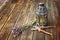 Vintage oriental lamp, sage plant and garden scissors on wooden table. still life concept. fine art.