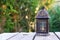 Vintage oriental lantern over wooden table