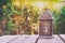 Vintage oriental lantern over wooden table outdoors