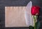 Vintage paper red natural rose plume on wooden