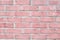 Vintage pastel pink color brick wall horizontal. Clean Background for design.