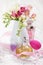 Vintage perfume bottles and flowers