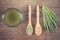 Vintage photo, Barley grass with beverage and grain with young powder barley on spoon