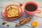 Vintage photo, Cup of coffee and fresh baked fruitcake on boards