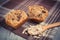 Vintage photo, Fresh muffin with oatmeal baked with wholemeal flour on checkered tablecloth, delicious healthy dessert