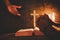 Vintage photo of hand with Bible praying , Hands folded in prayer on a Holy Bible