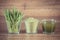 Vintage photo, Heap of young powder barley, barley grass and beverage on wooden background