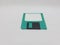 Vintage Photo Realistic Small Electronic Magnetic Floppy Disk for Old Computer Data Storage in White Isolated Background