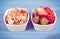 Vintage photo, strawberries, wheat and rye flakes in bowl on boards, healthy lifestyle