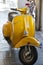 Vintage Piaggio Vespa in yellow color